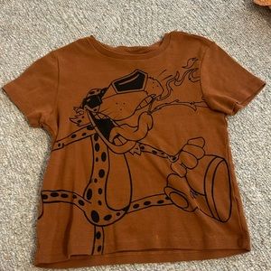 Dark brown-orange Chester the cheetah top. Size medium.